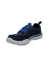 Zapatillas Hush Puppies modelo Alfie Lace de color azul marino, con cordones azules y suela blanca de EVA con detalles en azul.