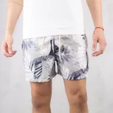 Short de baño con estampado de hojas en tonos grises y beige, con cintura elástica y cordón ajustable.