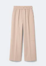 Pantalón de corte recto en color beige, con cintura elástica y costura frontal decorativa.