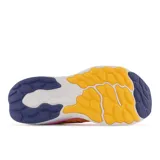 Championes de running New Balance Fresh Foam X 1080v12, color amarillo con detalles en rosa, violeta y azul.