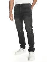 Pantalón de jean corte skinny, color gris oscuro, con diseño de cinco bolsillos, cierre de cremallera y botón metálico. Presenta remaches con logo de la marca en los bolsillos delanteros y parche con logo en la parte trasera de la cintura.