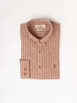 Camisa de hombre de manga larga con rayas verticales en tonos verde claro y blanco. Confeccionada en una mezcla de lino y algodón, presenta cuello abotonado y bolsillo en el pecho.
