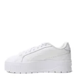 Championes de plataforma Puma modelo Karmen II L, color blanco, con suela gruesa texturizada y detalles de la marca en tono dorado en el lateral.