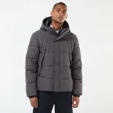 Campera acolchada de corte recto en color gris, con capucha ajustable, cierre frontal de cremallera y botones a presión, y bolsillos laterales.