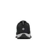 Championes de trekking Columbia modelo Crestwood, color negro con suela gris. Confeccionados con tecnología impermeable Omni-Tech y suela de alta tracción Omni-Grip, diseñados para caminatas y terrenos variados.