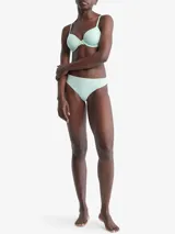 Colaless color celeste de microfibra suave con bordes cortados a láser y logo de Calvin Klein estampado en la cadera.