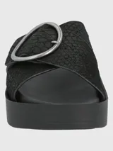 Sandalias plataforma Hush Puppies modelo Gise de cuero color negro, con diseño de tiras cruzadas texturizadas y detalle de hebilla circular metálica plateada.