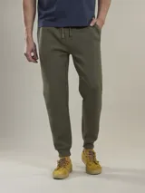 Pantalón de jogging negro con cintura elástica y cordón ajustable.