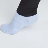 Calza larga de punto liso color negro, con cintura alta para mayor comodidad durante el embarazo.