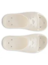 Sandalia tipo ojota Under Armour de una sola pieza, confeccionada en material EVA moldeado de secado rápido. Presenta un diseño ergonómico con orificios de drenaje laterales y en la plantilla, ideal para uso en vestuarios o piscina. Incluye el logo de la marca en relieve sobre la banda superior y una suela texturizada para mayor tracción.