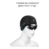 Gorro deportivo gris de la marca Rhinowalk con cubierta extendida para los oídos y diseño con ranuras laterales para gafas. Es elástico, flexible y apto para actividades al aire libre como correr o ciclismo.