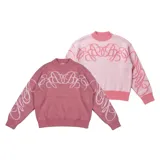 Sweater tejido reversible de corte boxy fit, con diseño gráfico de líneas curvas entrelazadas en el pecho y las mangas. Presenta un lado en tono rosa oscuro y el reverso en rosa claro, con cuello redondo y puños acanalados.