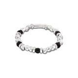 Pulsera elástica con cuentas de aleación de metales bañadas en plata y cristal de murano negro.