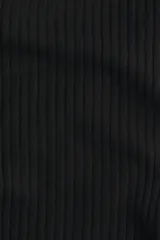 Pantalón tipo legging acampanado de punto acanalado fino, con cintura plegable y laterales fruncidos que generan un efecto drapeado.