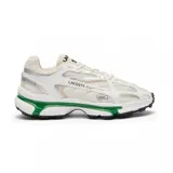 Championes Lacoste modelo L003 2K24, de diseño deportivo y urbano. Presentan una combinación de malla técnica y paneles sintéticos en tonos blanco y beige, con detalles en plateado. La suela destaca por su inserción en color verde vibrante y una base con relieve para mayor tracción.
