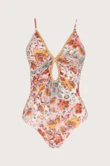 Traje de baño entero con estampado floral multicolor, escote en V con detalle trenzado y tirantes finos regulables.