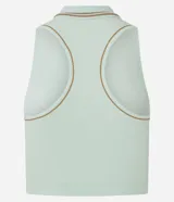 Top deportivo Get Over de microfibra seamless con textura acanalada, color verde menta, cuello polo con cierre frontal y detalles de líneas finas en el cuello.