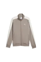 Campera Puma modelo T7 Track Jacket 692462, de color beige con franjas blancas en las mangas y cuello alto. Cuenta con cierre frontal completo y bolsillos laterales.