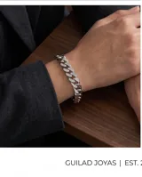 Pulsera de eslabones tipo cubana fabricada en acero, con incrustaciones de circonias en la parte superior de cada eslabón.