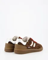 Championes Coolway modelo Goal Dark Leo con estampado animal print de leopardo, franjas laterales blancas, cordones rojos y detalles en tono plateado y marrón.
