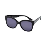 Lentes de sol Teresa Calandra modelo Margot con armazón de acetato negro y cristales oscuros. Presenta un diseño de estilo cat-eye moderno con el logo de la marca grabado en la patilla y en el cristal.