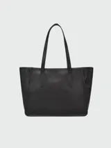 Cartera tipo tote bag de cuero negro, con textura granulada característica de la línea Le Foulonné. Posee dos asas superiores para llevar al hombro.