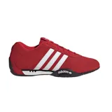 Championes Adidas Adiracer LO de perfil bajo, confeccionados en gamuza de color rojo con las icónicas tres tiras laterales en blanco. Presentan un diseño inspirado en el automovilismo con suela de goma negra y detalle de marca en el lateral.