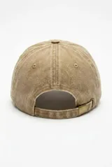 Gorra de algodón con efecto gastado y visera curva.