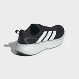 Championes de running Adidas Supernova Glide, color negro con las tres tiras clásicas en blanco y suela con amortiguación gruesa.