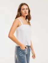 Musculosa blanca de lino con breteles anchos y diseño de franjas combinadas con lurex.