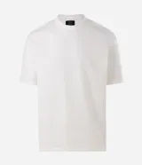 Remera de manga corta Blue Steel con corte relaxed y textura de tejido mini waffle. Presenta cuello redondo y un diseño minimalista en color blanco.