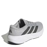 Championes de running Adidas Galaxy 8 M para hombre, en color gris con las clásicas tres tiras en tono oscuro y suela blanca amortiguada.
