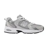 Championes New Balance MR530 en color gris oscuro y blanco, de diseño deportivo con tecnología ABZORB en la suela, capellada de malla y detalles sintéticos.