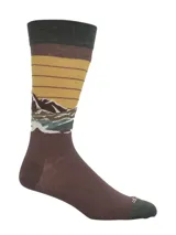 Medias de caña media con diseño estampado de paisaje montañoso en tonos marrón, amarillo y verde. Presentan puño y puntera en color verde oscuro.