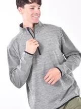 Buzo de cuello alto con cierre frontal parcial, de manga larga y diseño liso en color gris melange.