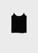 Musculosa negra con tirantes finos blancos y cuello redondo con ribete blanco. Diseño ajustado al cuerpo.