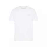 Remera Emporio Armani EA7 de manga corta y cuello redondo, color blanco, confeccionada en algodón pima. Presenta el logo de la marca estampado en tono plateado en el pecho.