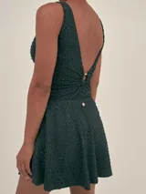 Minifalda negra de tela de traje de baño con protección UV50.