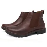 Botas Chelsea de cuero marrón oscuro, con elásticos laterales y suela de goma negra.