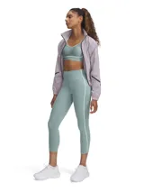 Calza deportiva de tiro alto Under Armour Meridian, color verde menta con detalle de ribete lateral en color blanco. Presenta diseño ajustado, bolsillos laterales y largo al tobillo.