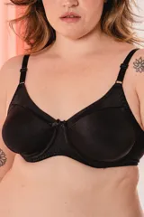 Soutien negro con aro y copas moldeadas reforzadas, sin costura. Confeccionado con tela que contiene fibra LYCRA®. Breteles elásticos anchos regulables.