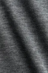 Top sin mangas de punto fino suave, con cuello alto y diseño de corte recto.