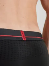 Pack de tres bóxer briefs largos Calvin Klein de microfibra negra con cintura elástica con logo.
