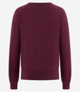 Suéter de punto color marrón chocolate, con cuello redondo y mangas largas con puños acanalados. Presenta un diseño básico y versátil de corte recto.