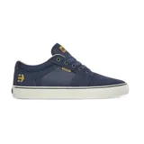 Championes Etnies Barge LS color azul marino con detalles en dorado. Capellada de gamuza y lona, con logo de la marca en el lateral y la lengüeta. Suela de goma blanca.