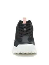 Zapatillas Caterpillar modelo Intruder Lite para mujer, de color negro con suela chunky blanca y detalles en rosado.
