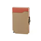 Billetera tarjetero Baleine de la colección Alabama, con diseño compacto de cuero en combinación de colores beige y naranja, y estructura interna de aluminio.