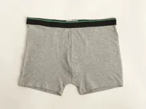 Boxer blanco de algodón con cintura elástica con el logo de la marca.