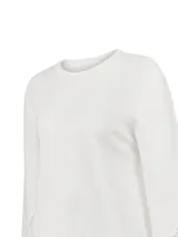Buzo de algodón orgánico color blanco, con cuello redondo, mangas largas voluminosas y delicados bordados calados en los puños.