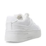 Championes blancos de plataforma con cordones.